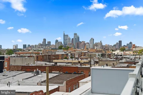 a view of city with tall buildings