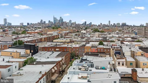 a view of a terrace with furniture and potted plants
