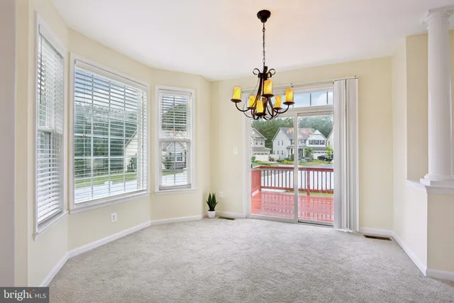 view of living room with furniture and large window