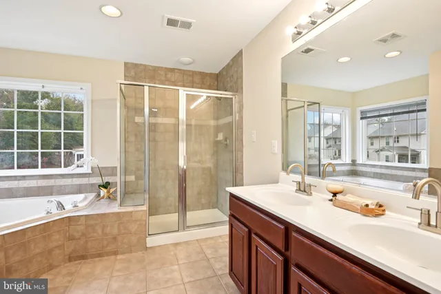 a utility room with sink dryer and washer