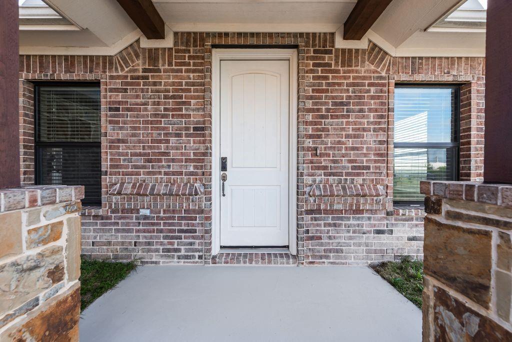 461 Pearson Ranch Road Azle, TX 76020 - Photo 12 of 40 Covered front patio.