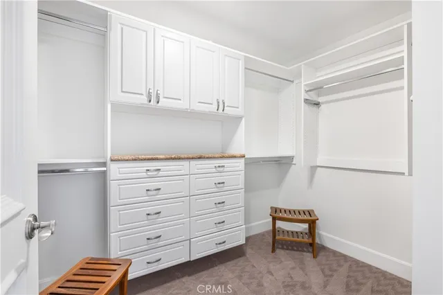 a large bathroom with a tub a sink and a shower