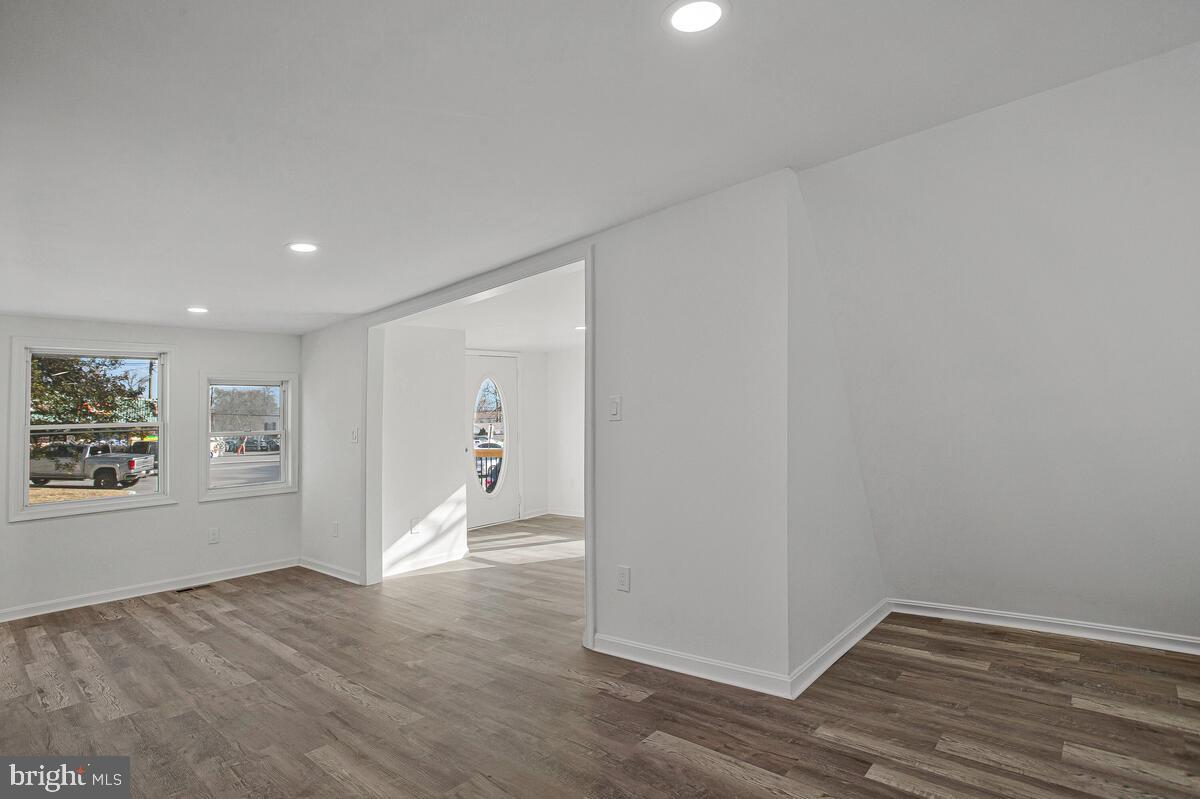 1660 Bay Ridge Road Edgewater, MD 21037 - Photo 14 of 33 a view of empty room with wooden floor and fan
