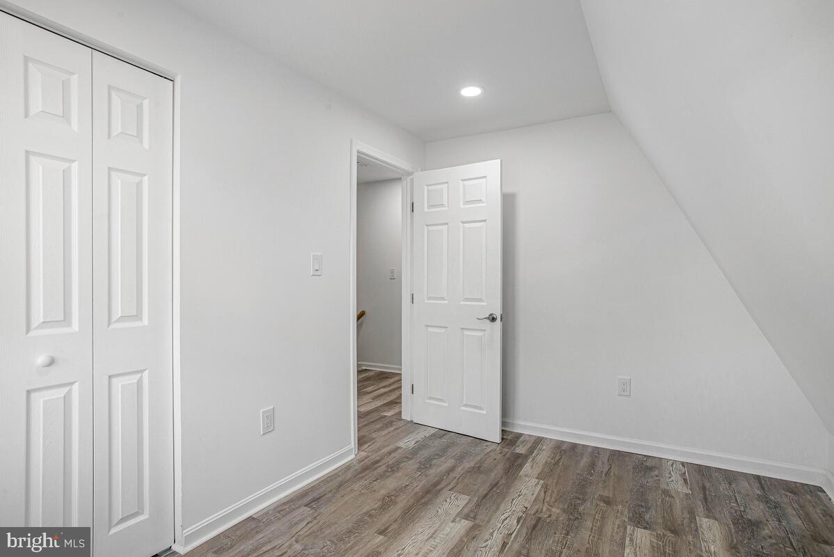 1660 Bay Ridge Road Edgewater, MD 21037 - Photo 20 of 33 a view of an empty room and wooden floor