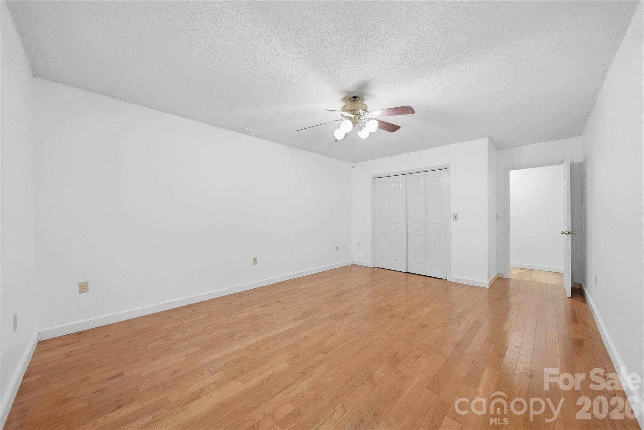 4771 Petra Mill Road Granite Falls, NC 28630 - Photo 32 of 46 a view of an empty room with a fan