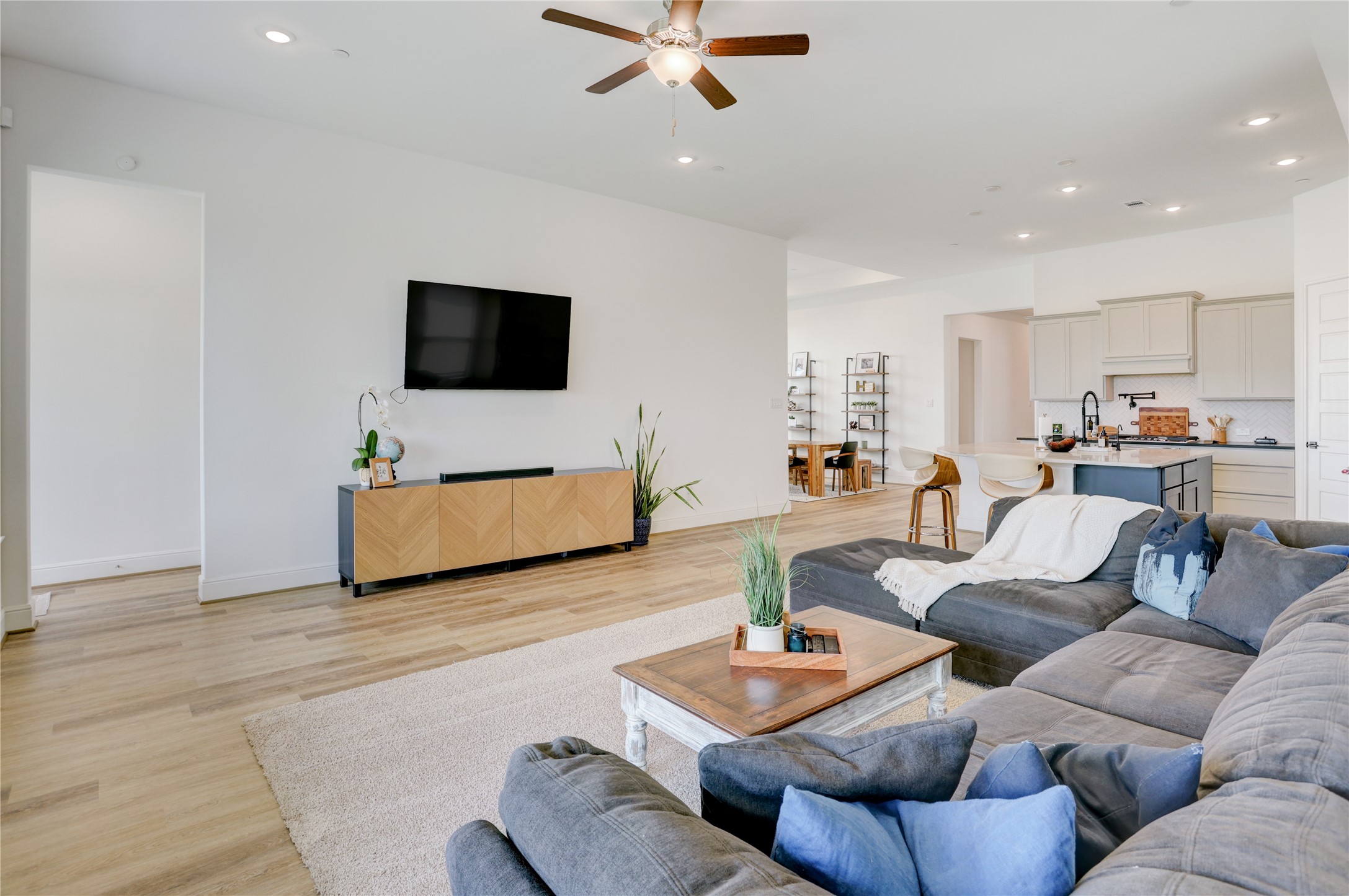 619 Rita Blanca Drive Webster, TX 77598 - Photo 14 of 44 Kick up your feet and relax in this spacious living room with quick access to the kitchen for your favorite snacks.