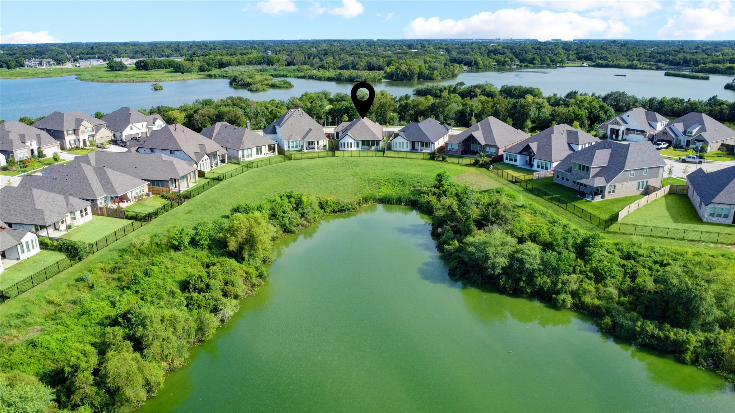619 Rita Blanca Drive Webster, TX 77598 - Photo 2 of 44 Built for the nature enthusiast with lake views behind and clear creek in front.