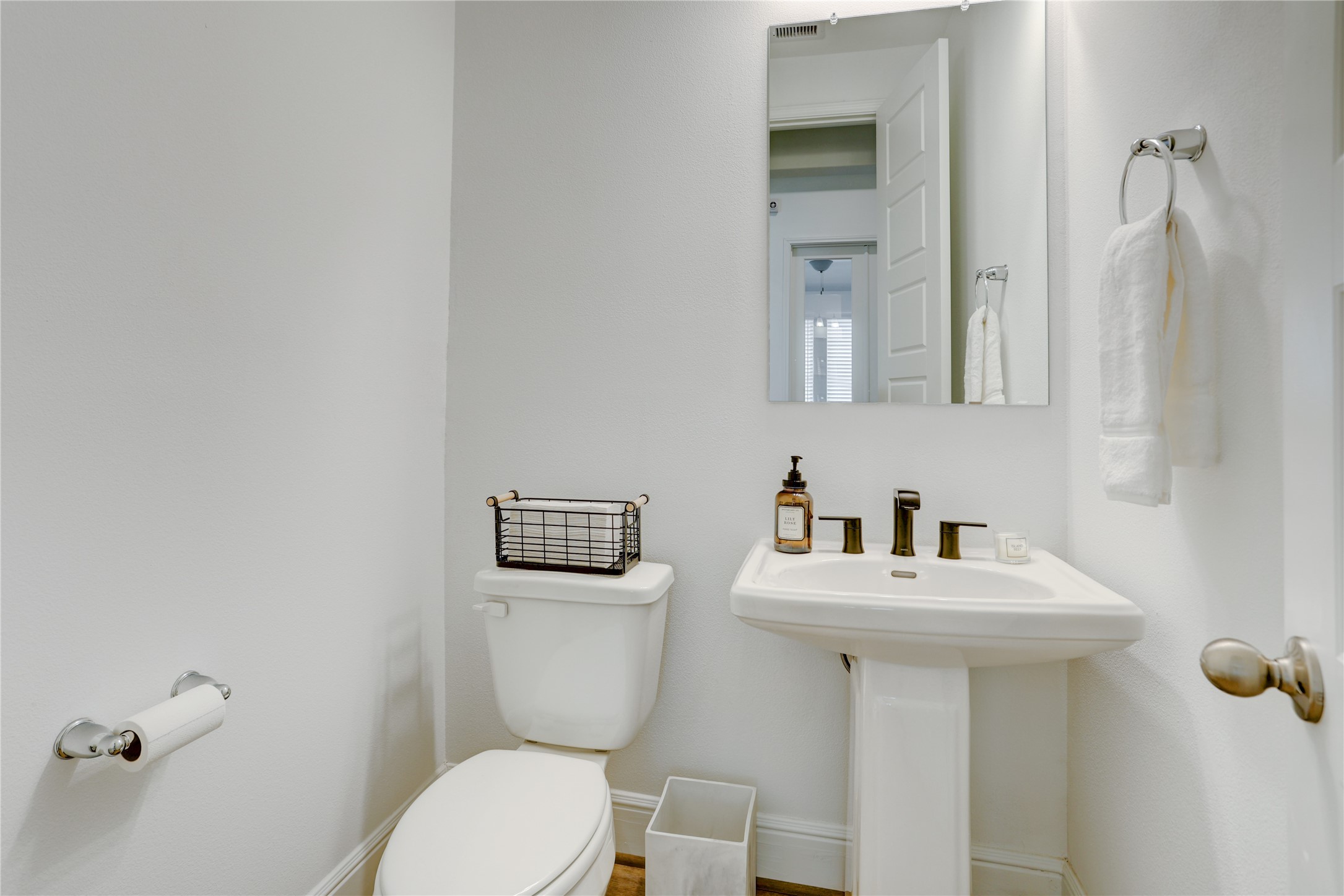 619 Rita Blanca Drive Webster, TX 77598 - Photo 27 of 44 This is modern half-bathroom featuring a pedestal sink and is strategically located for quick access for owners and privacy for guests.