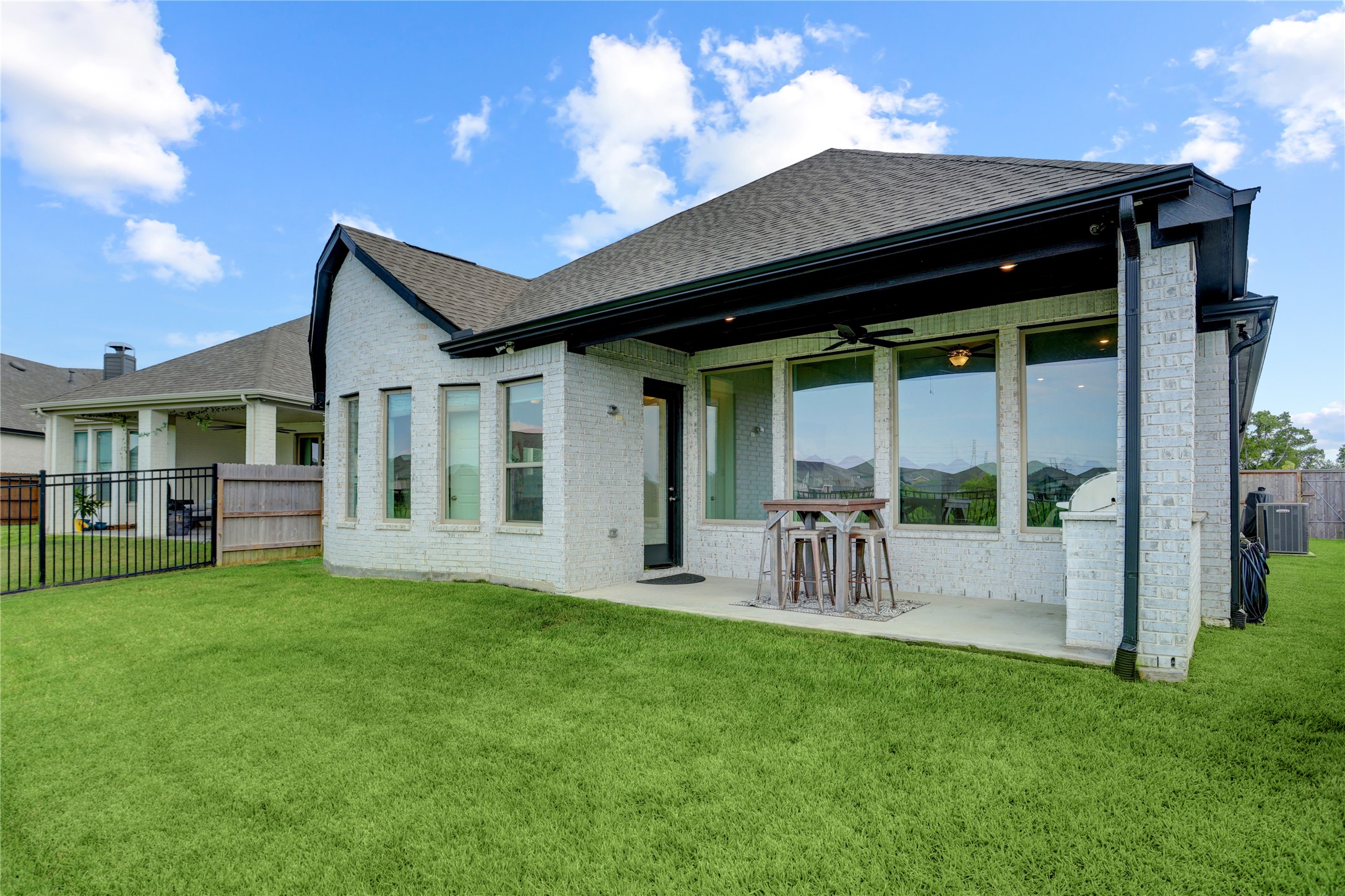 619 Rita Blanca Drive Webster, TX 77598 - Photo 34 of 44 The covered patio faces north providing a cooler space to relax and enjoy the outdoors.