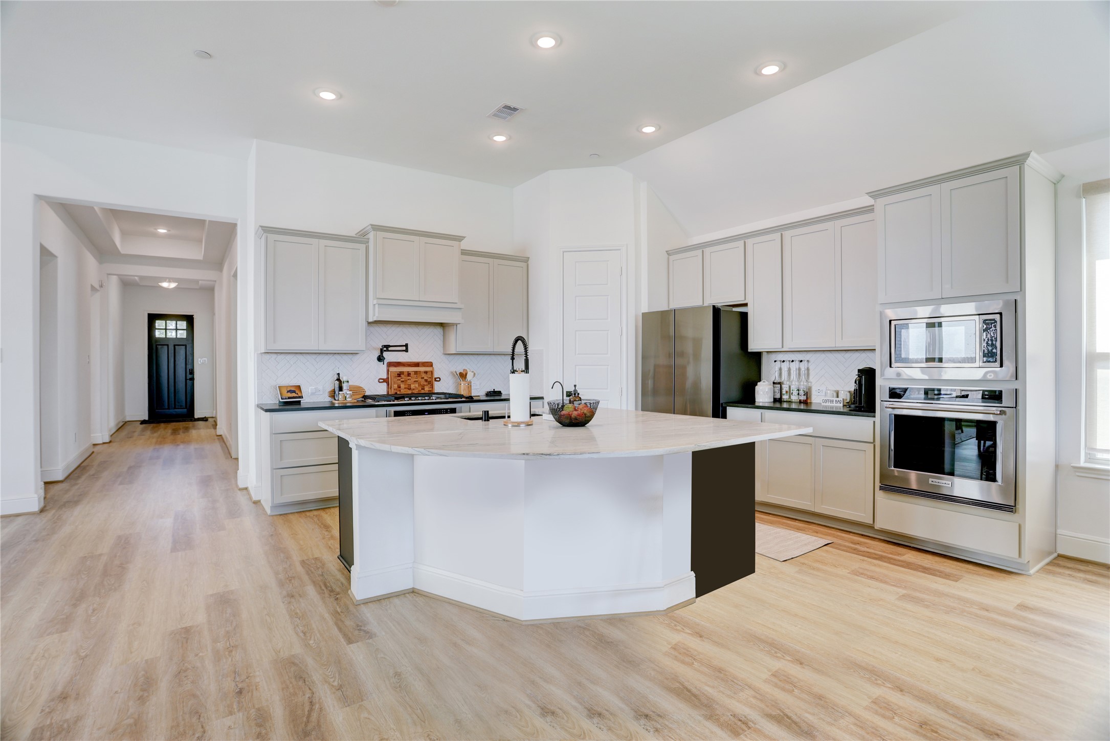 619 Rita Blanca Drive Webster, TX 77598 - Photo 8 of 44 The chef's dream kitchen offers all the bells and whistles in trending soft neutrals.