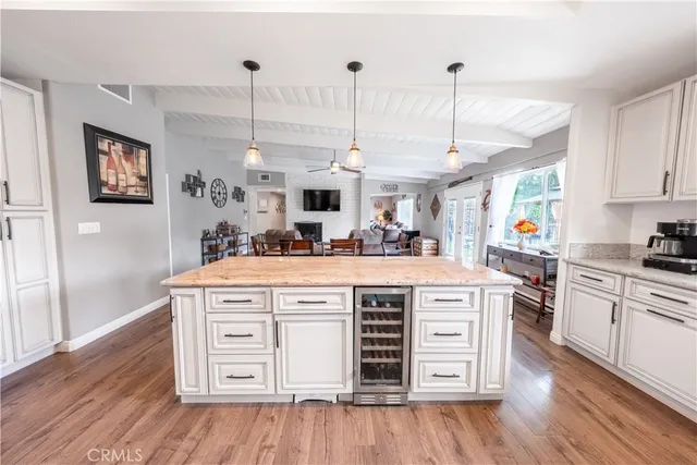 a bedroom with furniture and a baby crib