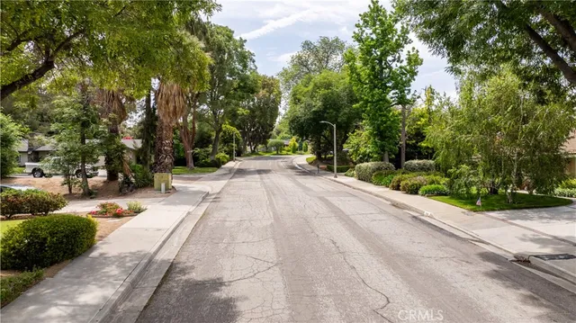 a view of a backyard of the house
