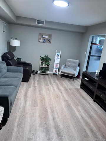 a living room with furniture and a couch