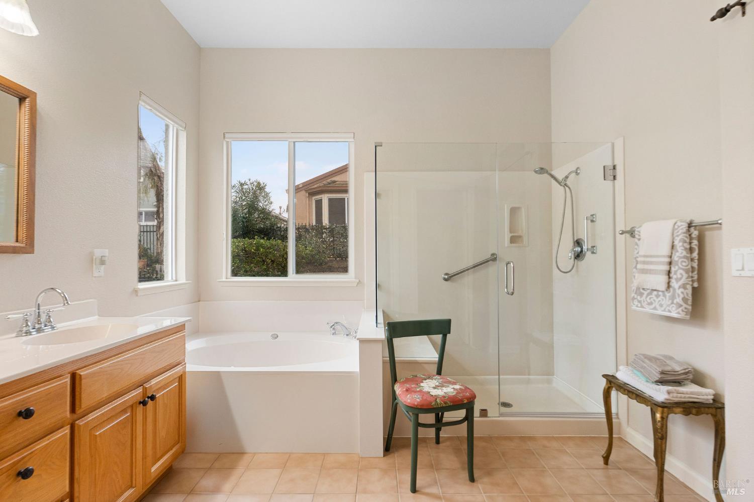 802 Summerset Drive Rio Vista, CA 94571 - Photo 26 of 74 primary bathroom with soaking tub and seated shower