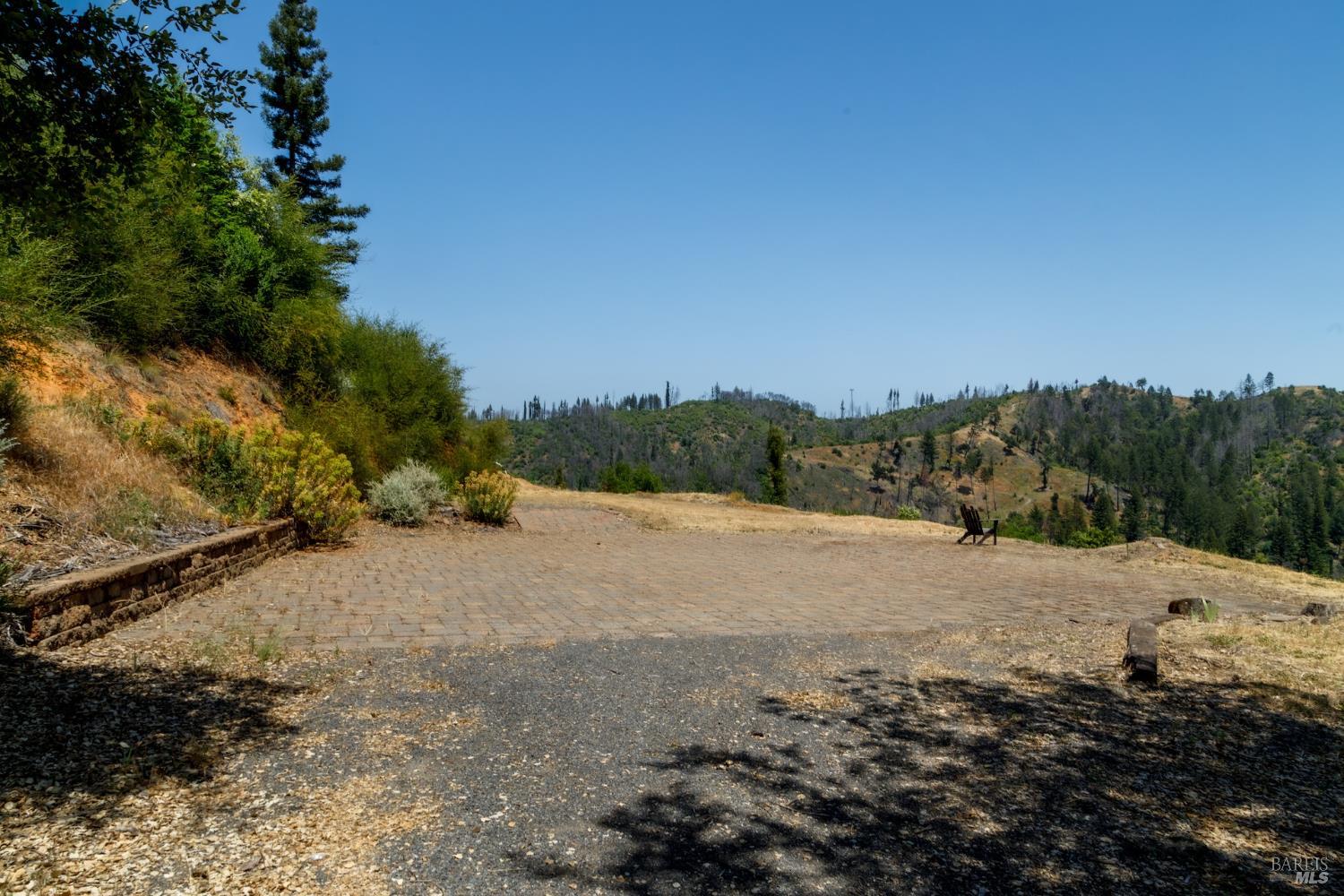 6600 Mill Creek Road Healdsburg, CA 95448 - Photo 3 of 26 a view of dirt road with a building in the background