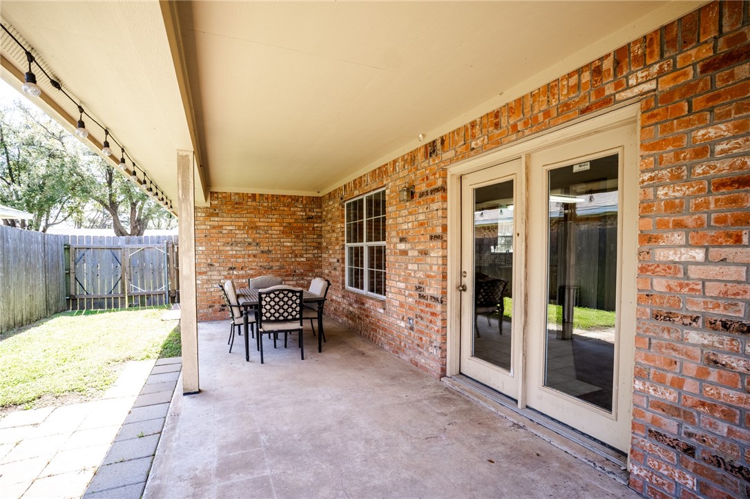 1016 Clark Street Mexia, TX 76667 - Photo 25 of 36 a view of a patio with a table and chairs