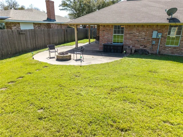 a view of outdoor sitting area with furniture