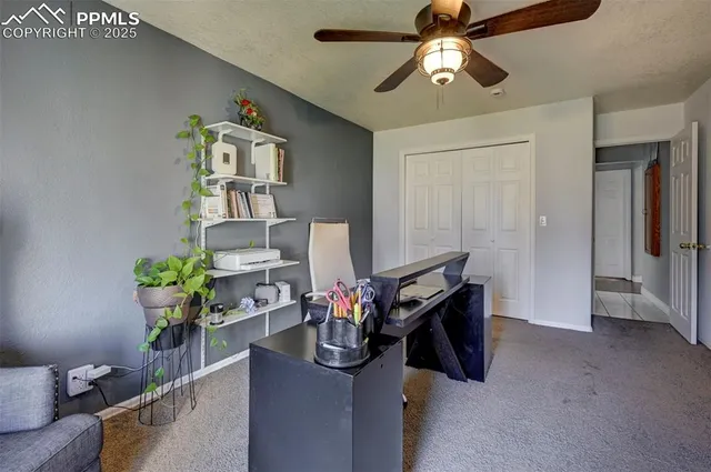 a view of a hallway with living room