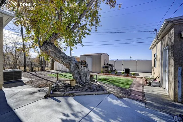 a garden view with a seating space