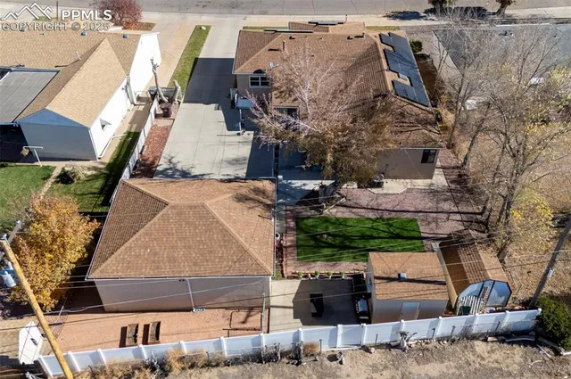 a aerial view of a house with roof