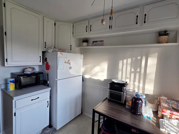 $279,900 | 390 Springlake Lane, Unit B, Aurora, IL 60504