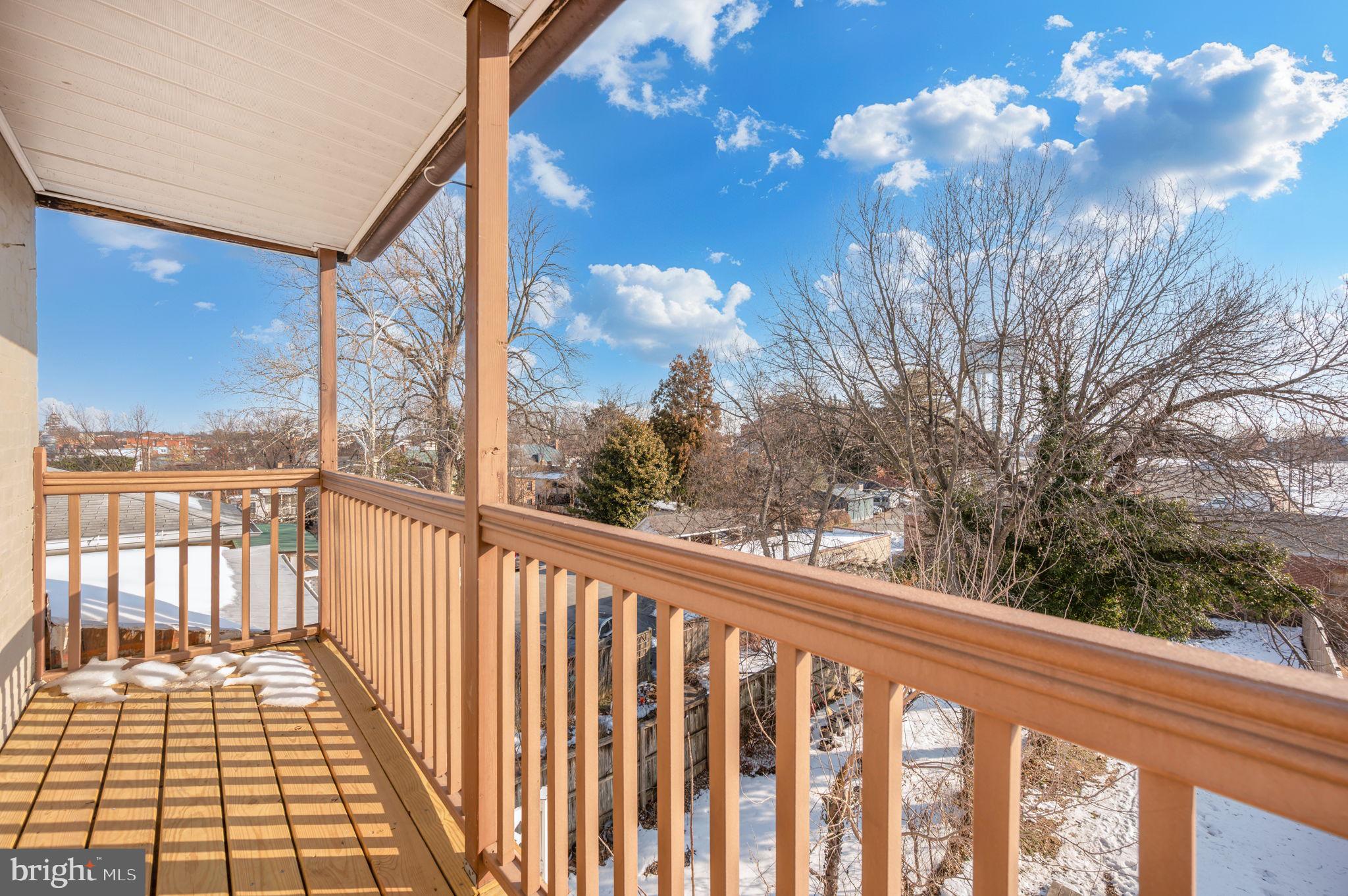 230 South Market Street, Unit 3 Frederick, MD 21701 - Photo 16 of 22 a view of a balcony with wooden floor