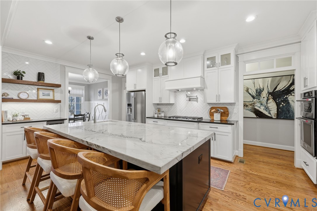 7201 Amarone Way New Kent, VA 23124 - Photo 13 of 46 Gas cooking, pot filler, & wine fridge