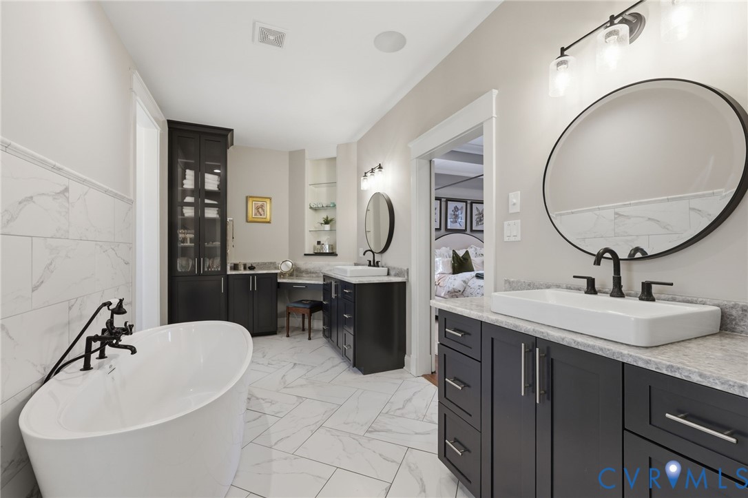 7201 Amarone Way New Kent, VA 23124 - Photo 24 of 46 a bathroom with a double vanity sink mirror and bathtub