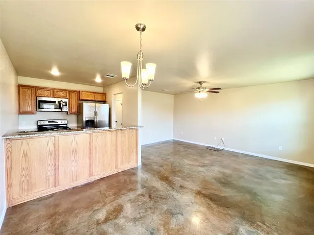 a view of a kitchen with a sink