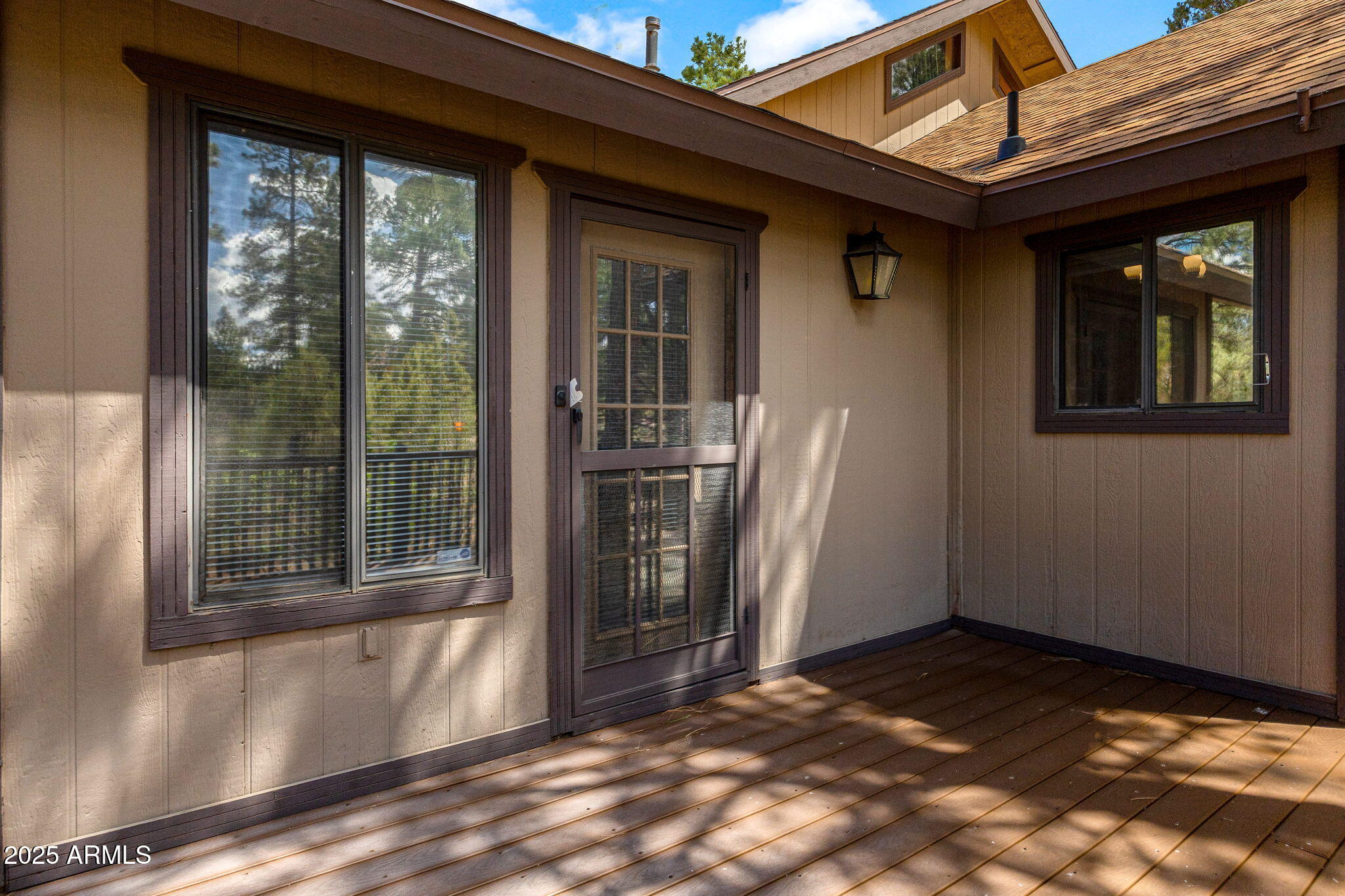 2240 Roundabout Way Overgaard, AZ 85933 - Photo 6 of 47 a view of a door and wooden floor in front of house