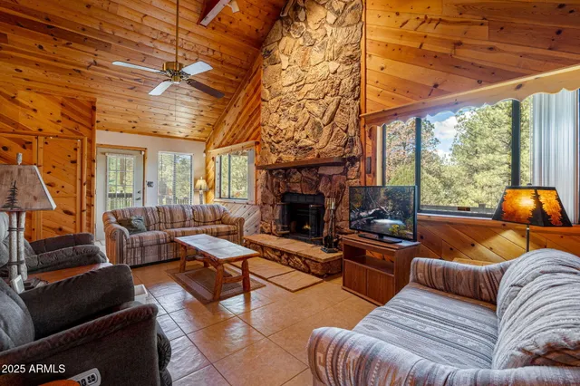 a view of backyard with wooden fence