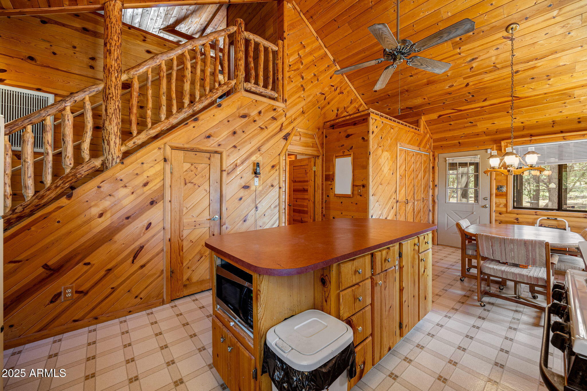 2240 Roundabout Way Overgaard, AZ 85933 - Photo 11 of 47 a bathroom with sink mirror and a toilet