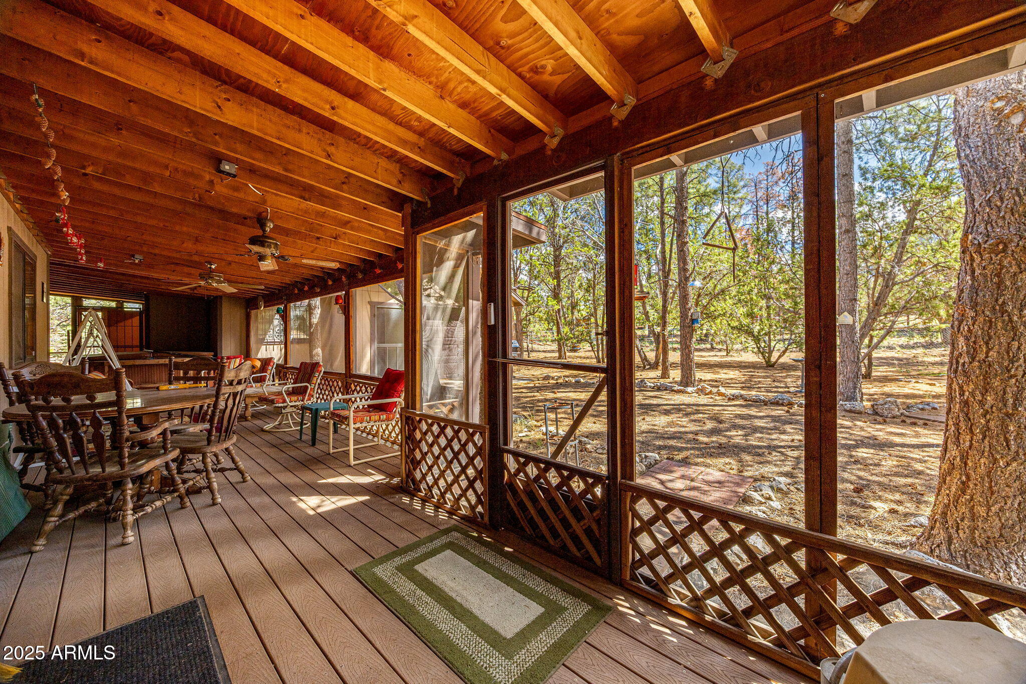 2240 Roundabout Way Overgaard, AZ 85933 - Photo 26 of 47 a view of a patio with wooden floor