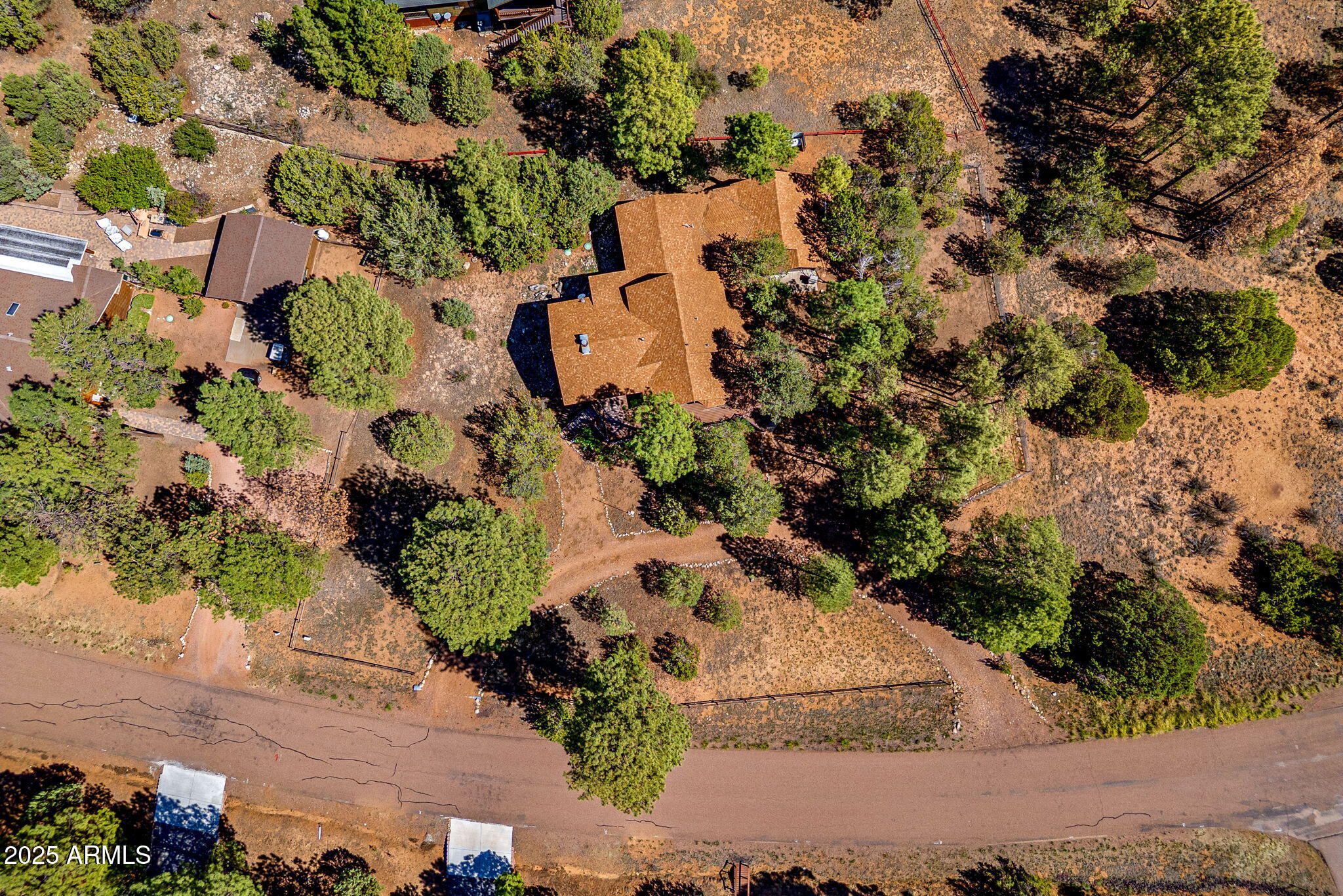 2240 Roundabout Way Overgaard, AZ 85933 - Photo 38 of 47 an aerial view of a house with a yard
