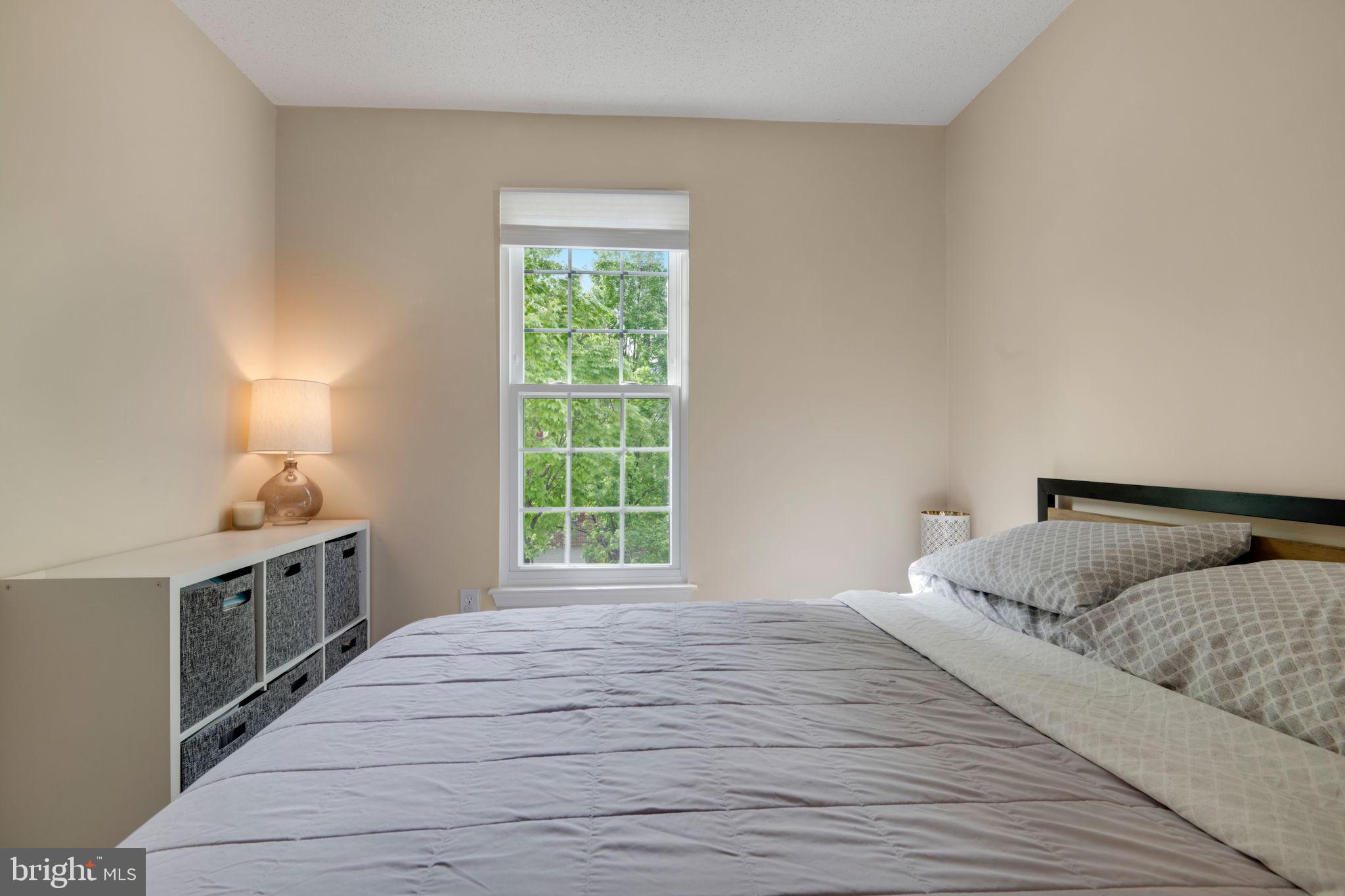 2348 Cold Meadow Way Silver Spring, MD 20906 - Photo 19 of 30 a bedroom with a bed and a window