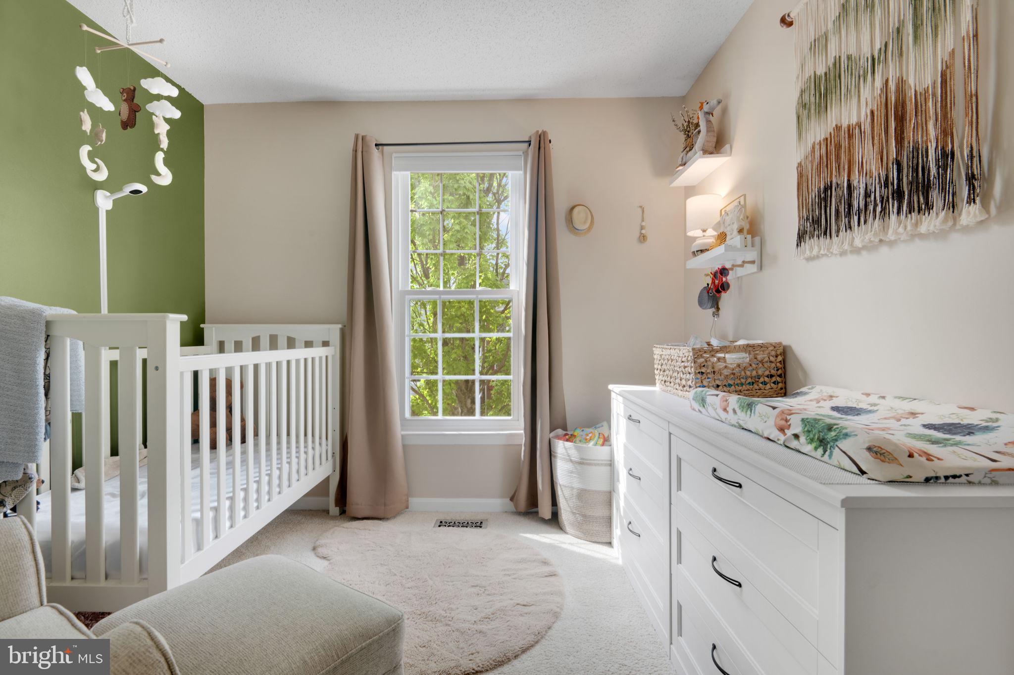2348 Cold Meadow Way Silver Spring, MD 20906 - Photo 21 of 30 a bedroom with a bed and a window