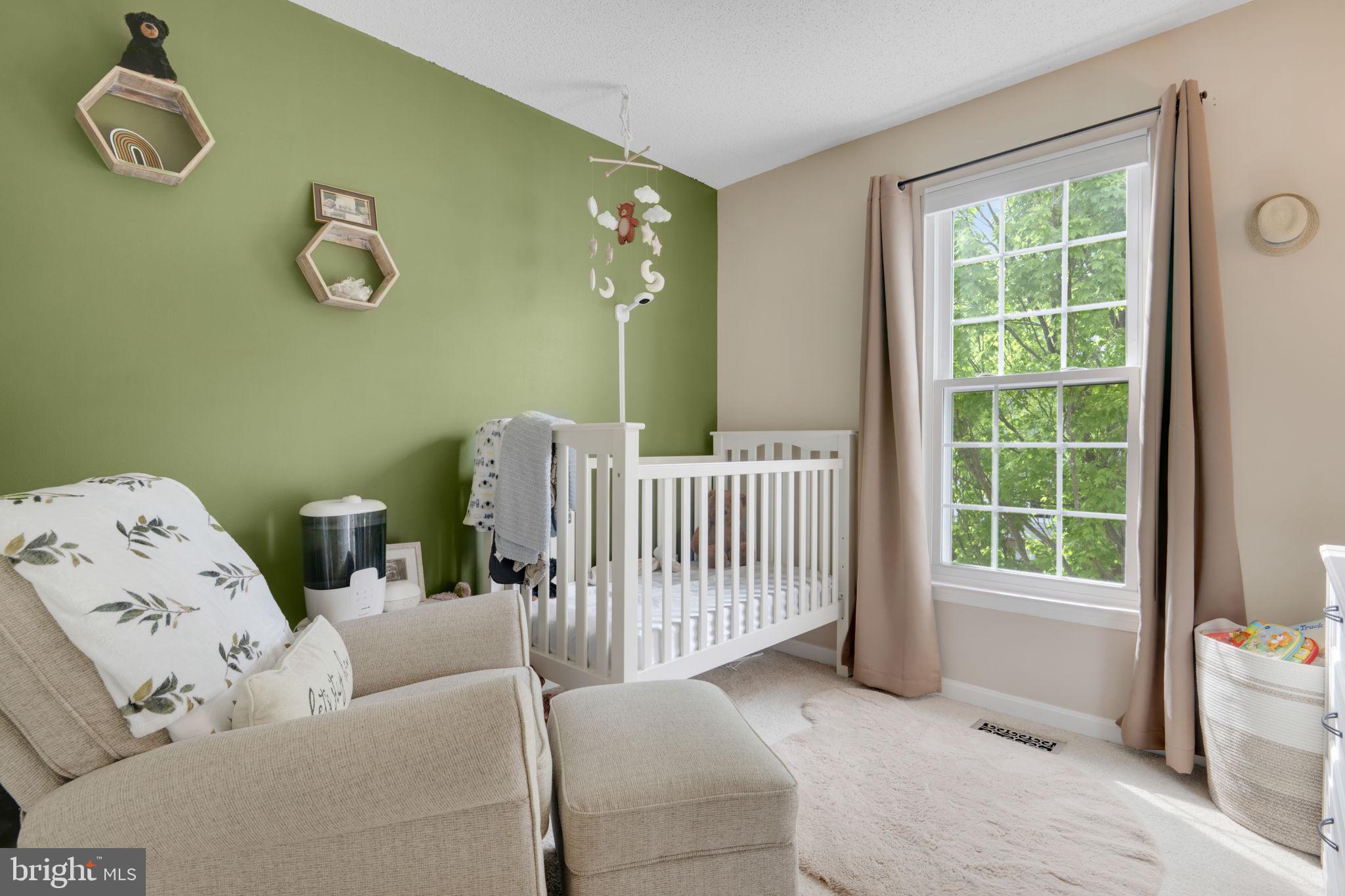 2348 Cold Meadow Way Silver Spring, MD 20906 - Photo 22 of 30 a living room with furniture and a window