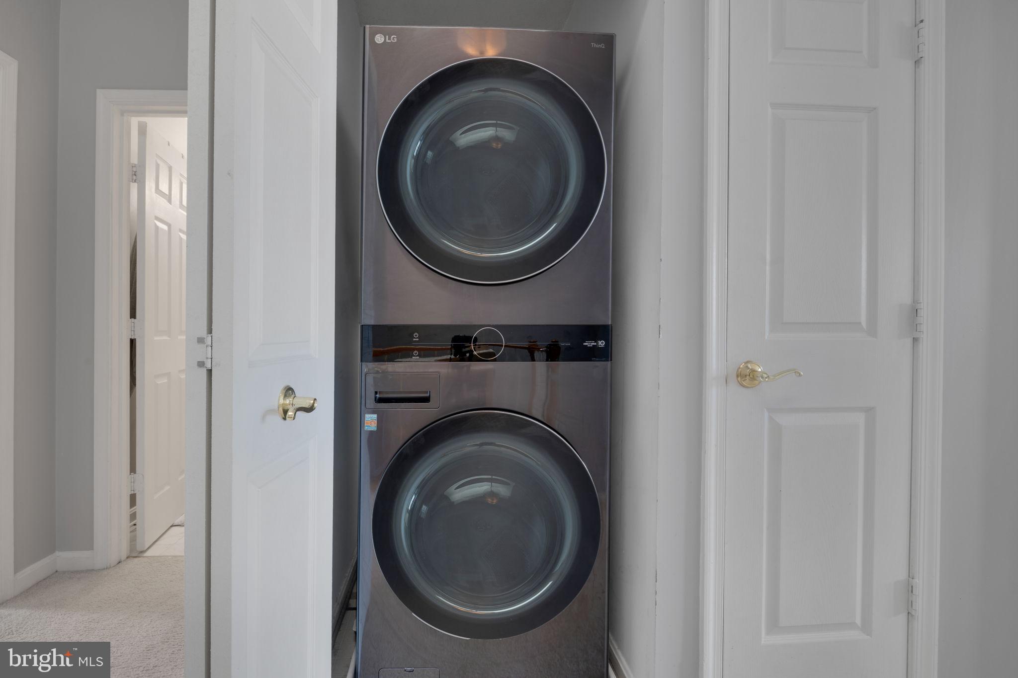 2348 Cold Meadow Way Silver Spring, MD 20906 - Photo 23 of 30 a close view of a utility room with dryer and washer