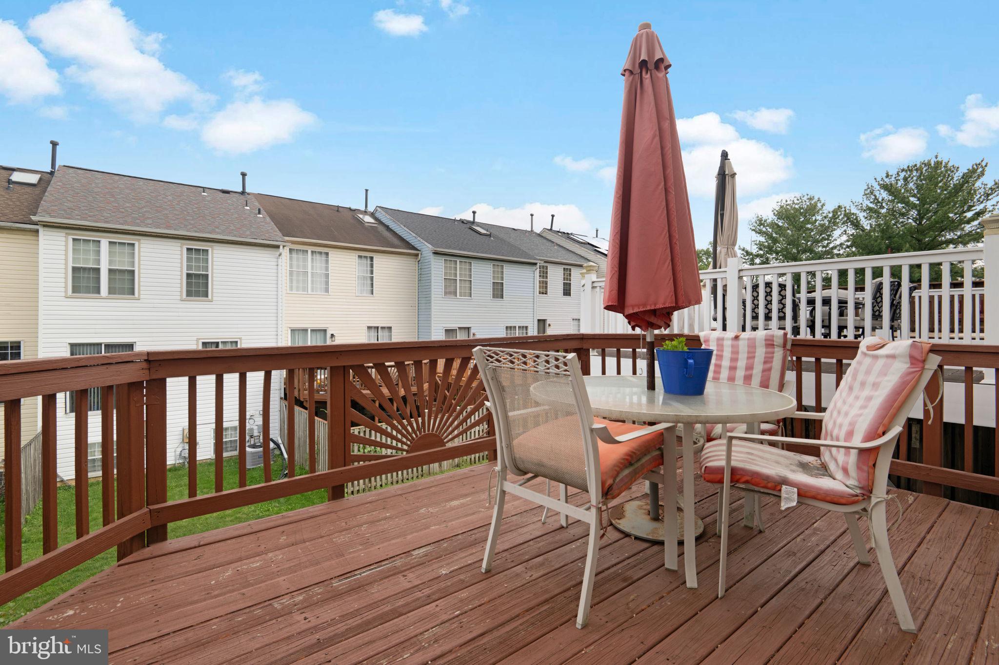 2348 Cold Meadow Way Silver Spring, MD 20906 - Photo 28 of 30 a view of a deck with furniture and wooden floor