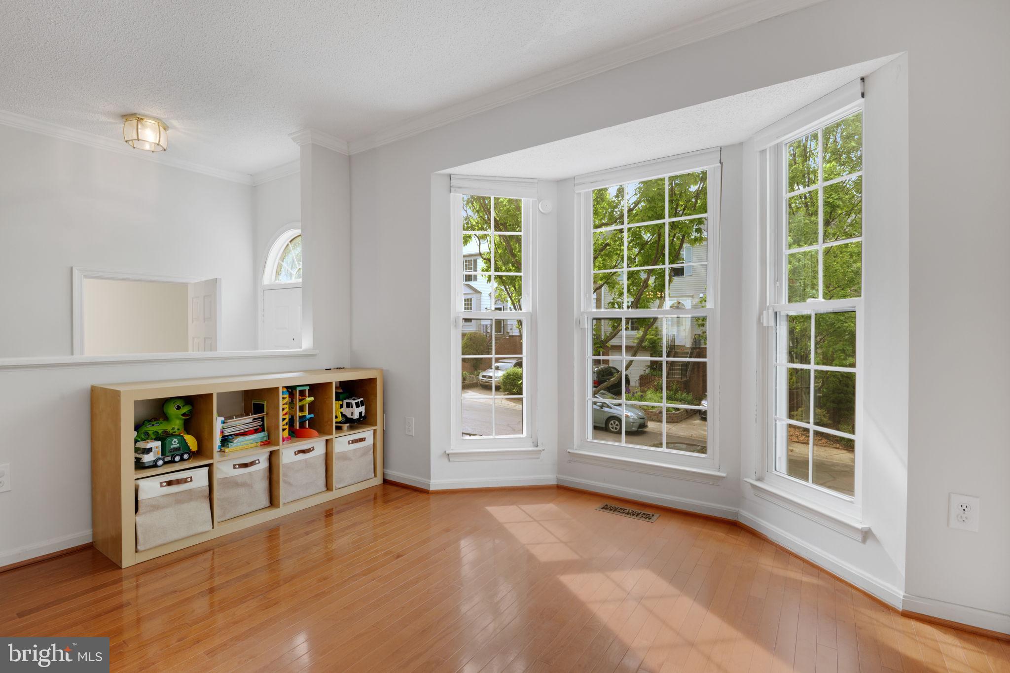 2348 Cold Meadow Way Silver Spring, MD 20906 - Photo 4 of 30 a view of an empty room with window and kitchen view