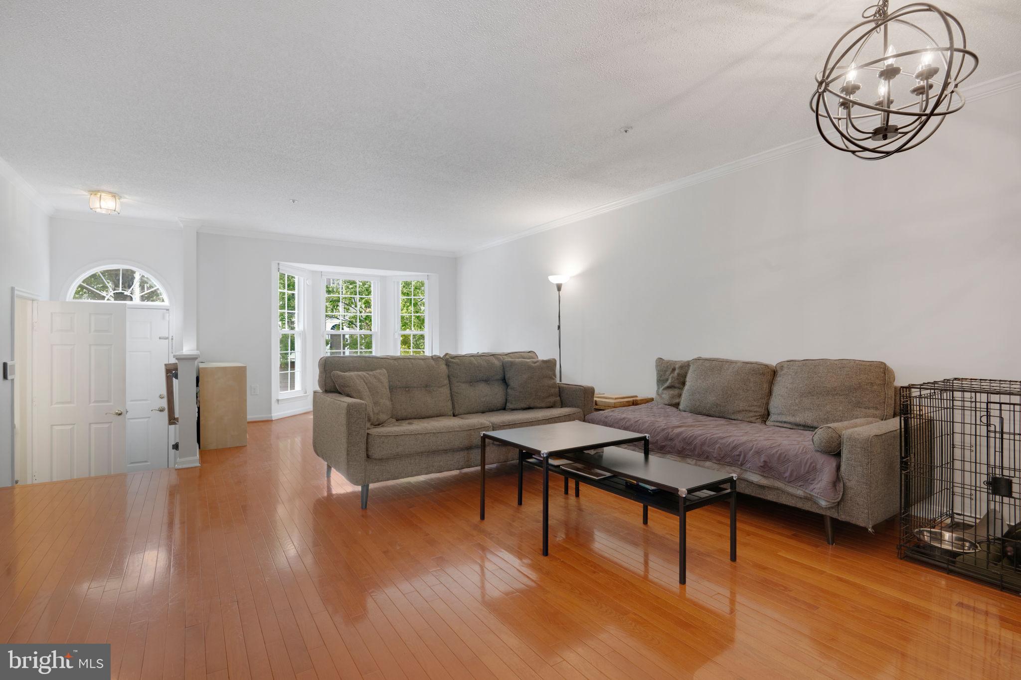 2348 Cold Meadow Way Silver Spring, MD 20906 - Photo 5 of 30 a living room with furniture and a large window