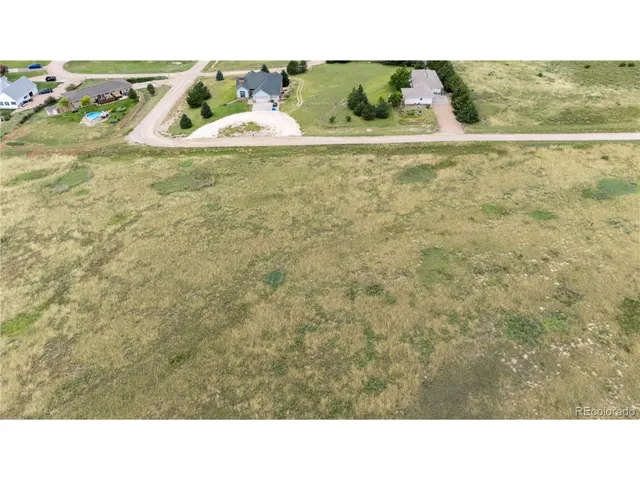 a black and white photo of a field