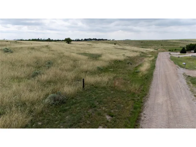 a open area with lake view and mountain view