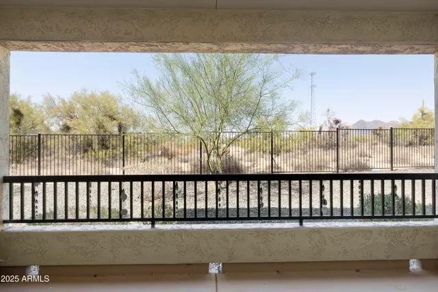 a view of a street from a balcony