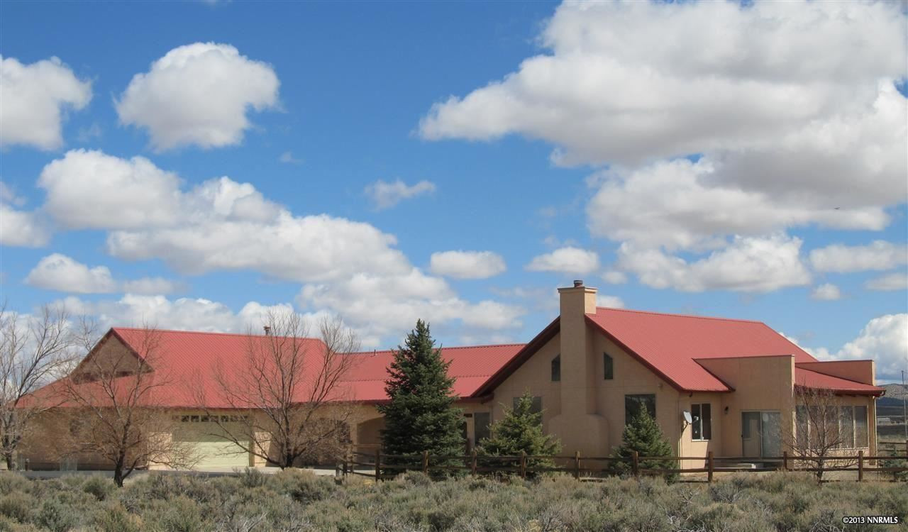11150 Osage Road Reno, NV 89508 - Photo 1 of 1 a view of a house with a yard