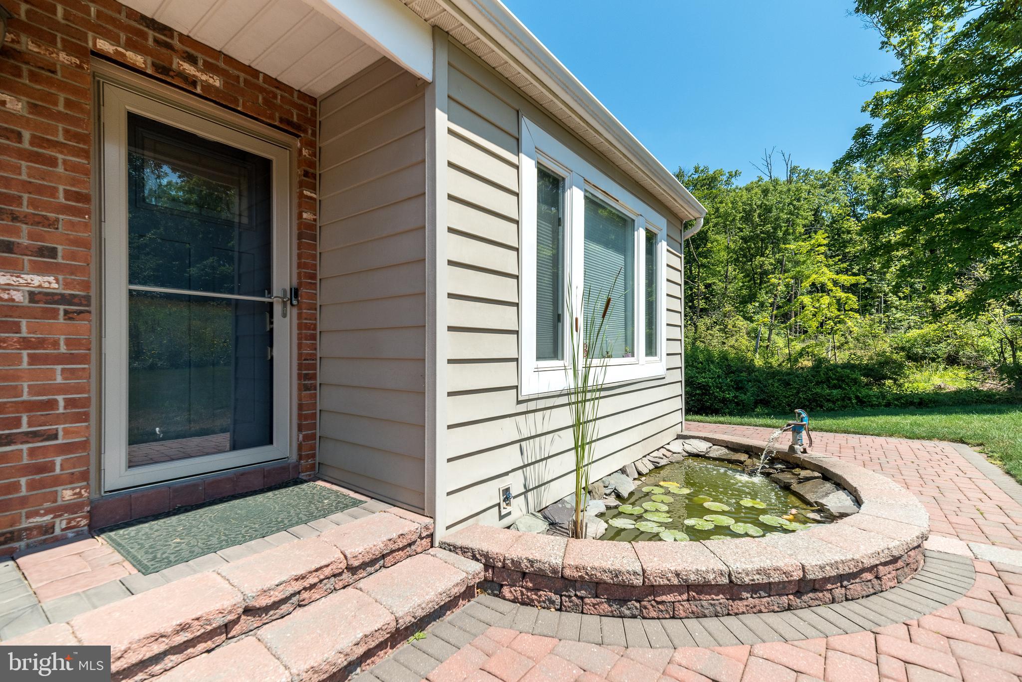 516 Upper Stump Road Chalfont, PA 18914 - Photo 5 of 37 Paved walkway entry