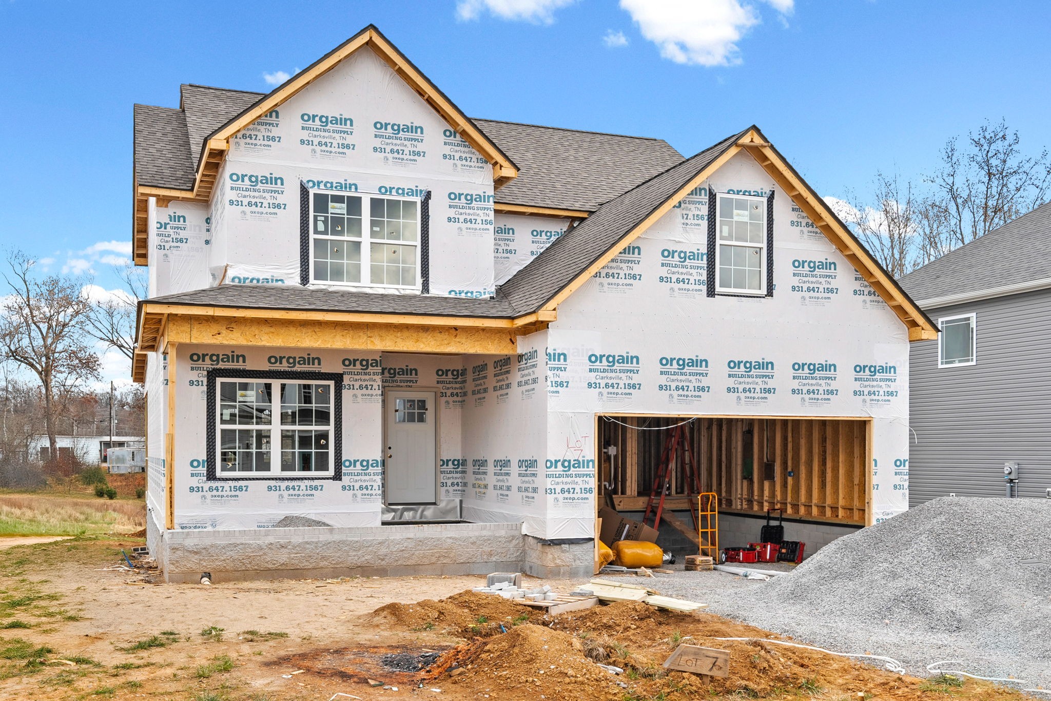 1105 Black Rock Road Clarksville, TN 37040 - Photo 2 of 45 a view of a house with large windows and a yard
