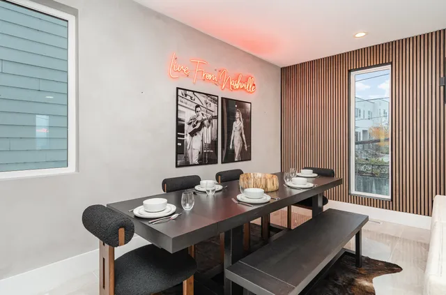 a view of a dining room with furniture window and outside view
