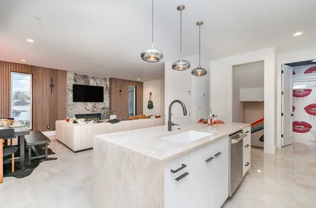 a view of living room with furniture and flat screen tv
