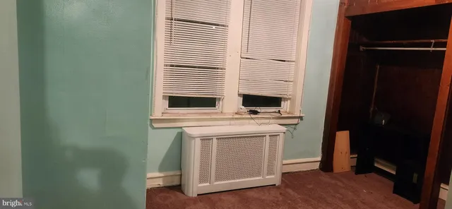 a kitchen with stainless steel appliances a sink and a refrigerator